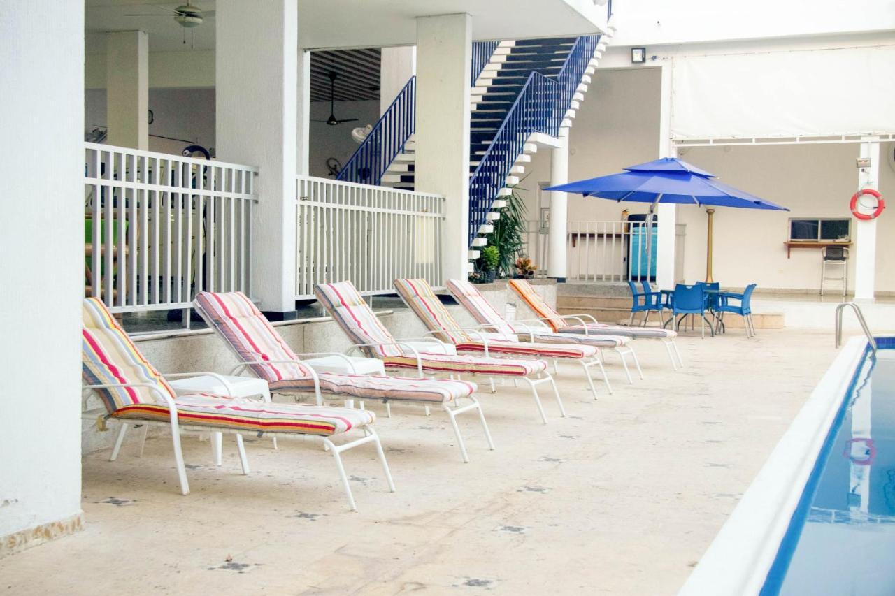 Hotel Mall Santana Del Rio La Dorada Bagian luar foto